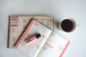 Diary and cup of coffee